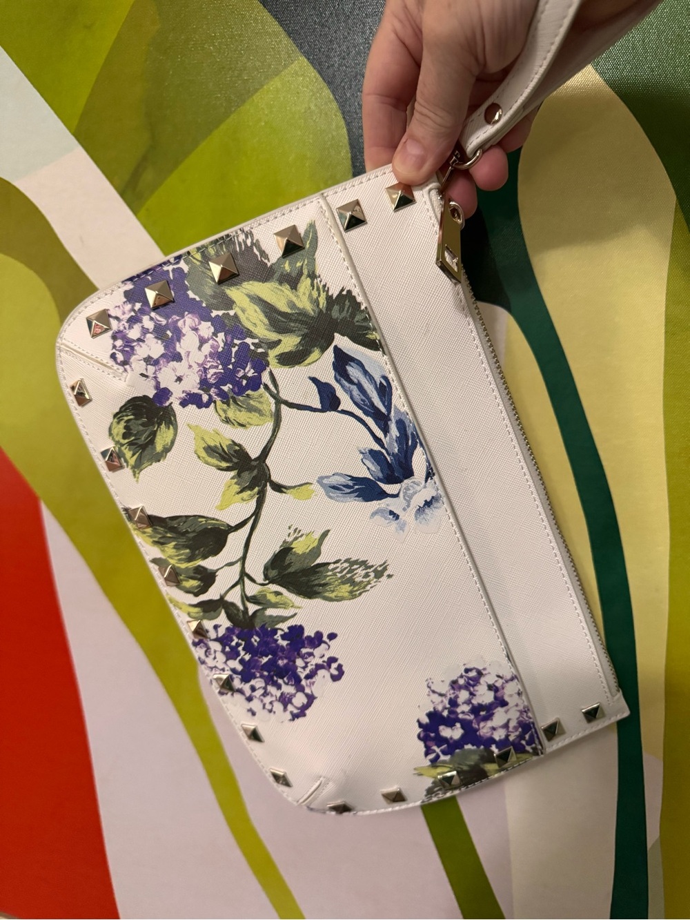 White House/Black Market hydrangea wristlet clutch with silver stud details